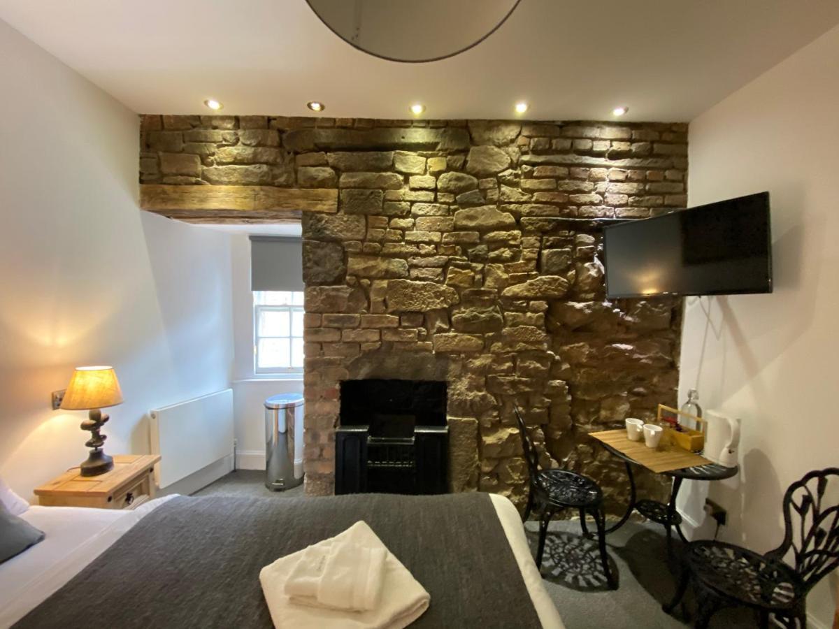 Aparthotel Royal Mile Balconies By The Castle à Édimbourg Extérieur photo The interior of the room